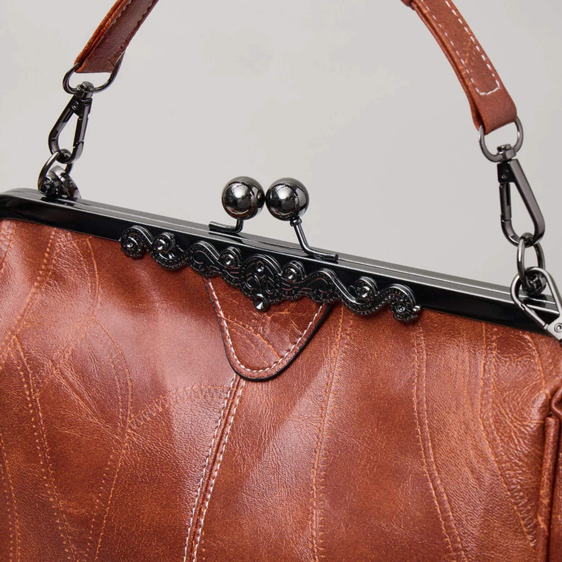 Vintage-Inspired Leather Kisslock Handbag